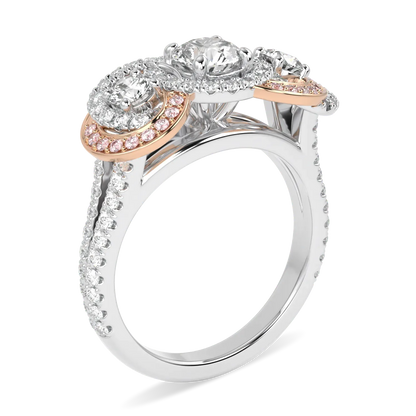 Platinum Rose Gold Three Stone Diamond ring from Blacklock's High Jewellery collection — through finger view